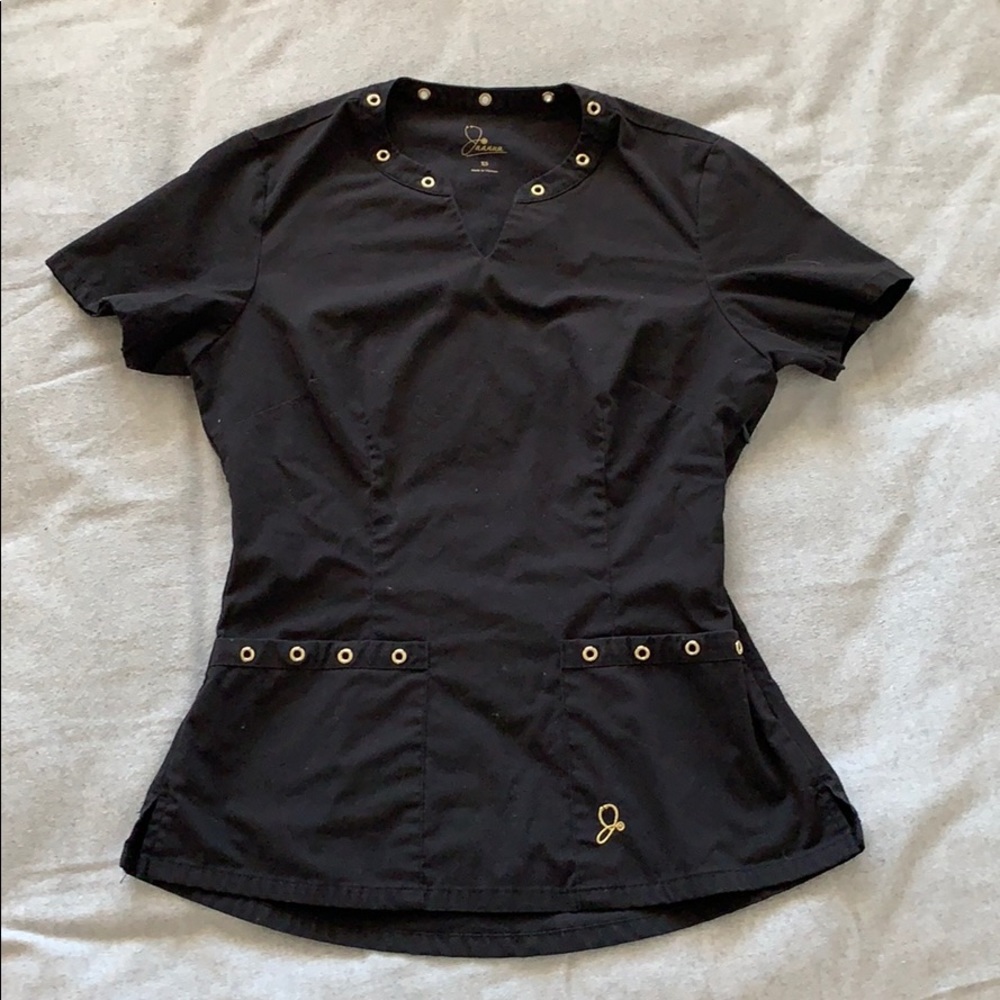 Jaanuu scrub top. Gold metal eyelet. Size XS